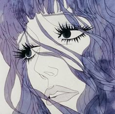 a drawing of a woman's face with long, wavy hair and blue eyes