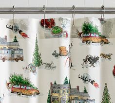 the shower curtain is decorated with christmas scenes and holiday themed decorations, including an old fashioned car