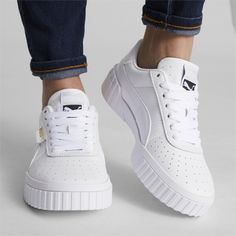 Step Up Your Sneaker Game With The Puma Cali Women's. These Sleek Black And White Leather Sneakers Are The Perfect Addition To Any Outfit, Adding A Touch Of Sporty Style To Your Everyday Look. The All-White Design Gives A Clean And Classic Feel, While The Puma Branding Adds A Touch Of Streetwear Flair. With A Comfortable Fit And Durable Construction, These Cali Sneakers Are A Must-Have For Anyone Looking To Elevate Their Footwear Collection. Stay On-Trend And Step Out In Style With The Puma Cali Puma Sneakers Outfit, Puma Sneakers Womens, Tennis Silhouette, West Coast Vibes, Shoe Goals, White Puma Sneakers, Puma Cali, Sneaker Outfits Women, Sneakers Puma