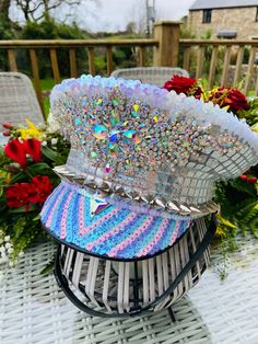 Silver, Purple, Pink & Blue Iridescent Sequin Military Festival Hat.  This hat has been lovingly handcrafted in Cornwall, UK. Each one is unique and one of its kind. Perfect for adding that extra sparkle to your party outfit! Please take care when handling it.  This beautiful hat is custom made for you so please forward your hat size in cm with the order . 4- 5 weeks to complete. Adjustable Silver Costume Hats And Headpieces For Festival, Handmade Costume Hat With Round Crown For Party, Adjustable High Crown Silver Hat, Funky Adjustable Party Hats, Adjustable Silver High Crown Hat, Adjustable Round Crown Hats For Celebration, High Crown Silver Hat For Party, Silver High Crown Hat For Party, Custom Festival Costume Hat With Curved Brim