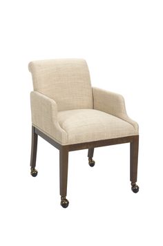 an upholstered chair with casteors and wheels on the legs, against a white background