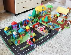 a child's play area with toys on the floor