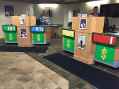 the front desk of an office decorated with lego blocks and pictures on it's sides