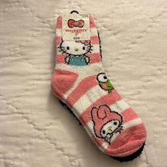 Hello Kitty & Friends Crew Fuzzy Socks 2 Pairs Size: 4-10 Cute Super Soft Socks For Playtime, Cute Super Soft Socks For Indoor, Cute Super Soft Indoor Socks, Cute Winter Non-slip Socks, Cute Super Soft Socks For Stocking Stuffers, Cute Pink Winter Socks, Cute Black Non-slip Socks, Cute Soft Pink Socks, Fun Pink Socks For Stocking Stuffers