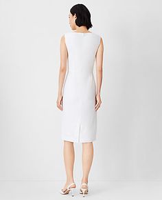 Elevate your wardrobe with the Ann Taylor Scoop Neck Sheath Dress, a piece that blends classic charm with modern sophistication. Perfect for warm weather, this dress features a crisp herringbone linen blend that ensures both comfort and style.

- **Size**: Regular - 10
- **Color**: White
- **Material**: 54% Linen, 29% Polyester, 15% Viscose, 2% Spandex; Lining: 100% Polyester
- **Gender**: Female
- **Features**: Sleeveless, scoop neck, hidden back zipper with hook-and-eye closure, back vent, ful Feminine White Sheath Midi Dress, White Sheath Dress With Back Zipper, Fitted Off-white Sheath Dress, Calvin Klein White Sheath Dress, White Stretch A-line Sleeveless Dress, Linen Sheath Dress, Elegant White Dress, White Herringbone, Taylor White