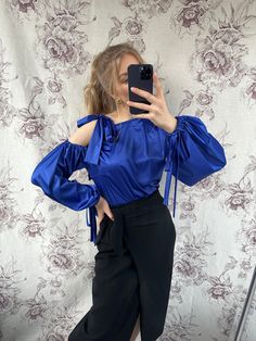 - Handmade satin bishop sleeve blouse, blue cut out sleeve blouse - Fabric information: satin with elastane Estimated to fit XS-S-M-L based on your desired fit. Measurements (laying flat): - Shoulders (back): 36 cm - Length: 60 cm - Sleeve: 70 cm - Armpit to armpit: 53 cm Please feel free to contact me if you need additional information or if you have any questions regarding this item SHIPPING INFO: Shipping price in the listing is for the "Standard Latvian post shipping". Includes tracking info Evening Blouse With Gathered Long Sleeves, Long Sleeve Stretch Blouse With Gathered Sleeves, Stretch Long Sleeve Blouse With Gathered Sleeves, Long Sleeve Blouse With Gathered Sleeves, Fall Long Sleeve Blouse With Elastic Shoulders, Satin Padded Blouse For Night Out, Balloon Sleeve Tops For Spring Party, Trendy Puff Sleeve Top For Party, Workwear Long Sleeve Blouse With Elastic Shoulders