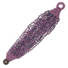 a purple beaded necklace with metal clasps and beads hanging from it's end