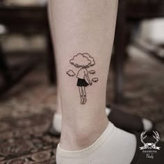 a person with a tattoo on their leg