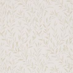 a white wallpaper with leaves on it