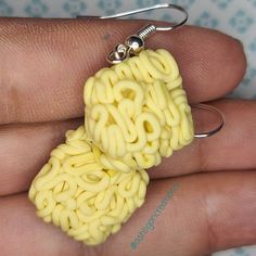 Ramen Earrings Noodles measure approximately between 1.5cm to 2.25cm Materials: ▫ Polymer Clay ▫ Hypoallergenic Hanging Earring Hook Each Ramen square is handmade by me, so you may receive a pair of earrings that are slightly different from the ones pictured in the listing. As they are all made by hand all are similar but no two pairs will ever be the same! I can also do custom orders. Please feel free to send me a message with any questions or ideas! Thanks for checking out my shop!