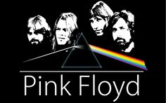 pink floyd poster with the dark side of the moon in front of him and his band