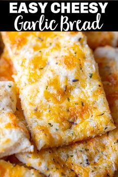 cheesy crackers piled on top of each other with cheese and seasoning