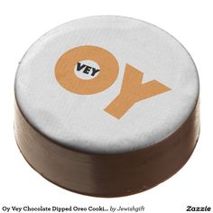 a chocolate covered oreo cookie with the word yy on it's side