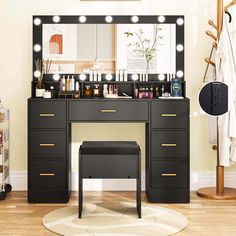 a vanity with lights and stool in front of it