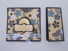 two cards with blue and white designs on them