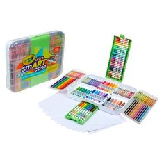 an assortment of art supplies including markers, pencils and pens in a plastic case