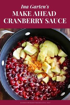 cranberry sauce in a pot with apples and oranges on the side text reads ina garden's make ahead cranberry sauce