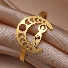 Adorn yourself with this exquisite Celtic Knot Moon phase Ring and Goddess moon Ring! Crafted with premium stainless steel in a luxe steel/gold color, this piece is sure to be the crowning glory of any look. Enjoy the numerous benefits of stainless steel - no rusting, no allergies, powerful anti-acid and anti-alkali features, no deformation and no fading. Polished to perfection with a shiny, smooth finish, this ring is truly comfortable to wear Witch Ring, Moon Phase Jewelry, Moon Phase Ring, Goddess Moon, Lunar Jewelry, Wicca Jewelry, Wiccan Necklace, Celestial Ring, Mystical Jewelry