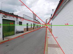 an empty street with red and green lines on it