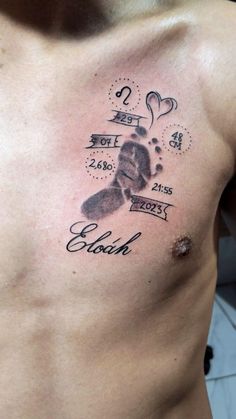 a man with a tattoo on his chest that has the name and footprints of two people