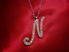 Beautiful Silver Plated Big Letter "N" Pendant Ornate with Sparkling Rhinestones. Silver Tone Link Chain Necklace with Lobster Claw Clasp. The Pendant is Signed inside the Pendant Loop/Bail. In very good vintage condition. N Necklace, Initial N, Big Letter, Big Letters, Letter N, Link Chain Necklace, Pendant Silver, Pendant Design, Chain Link Necklace