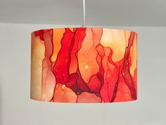 This listing is for one lamp/ceiling shade. Matching items also available please see the links below - Cushion Cover - https://www.etsy.com/uk/listing/1666103539/burnt-orange-watercolour-cushion-cover?ref=listings_manager_grid Fabric - https://www.etsy.com/uk/listing/1823569345/orange-fabric-abstract-fabric-stalactite?ref=listings_manager_grid Lamp/Ceiling shade size available are (For customers based in the UK/EU) : 20 cm Diameter 25 cm Diameter 30 cm Diameter 35 cm Diameter 40 cm Diameter Also Orange Lamp, Gold Lampshade, Orange Lamps, Abstract Fabric, Lamp Ceiling, Ceiling Shades, Orange Fabric, Harp, Live Light