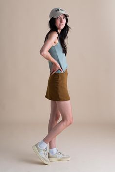 Introducing the Elsa Skort: the perfect blend of shorts and skirt for summer adventures. Crafted from organic French Terry cotton, it offers comfort and breathability. With its casual mid-thigh length and non-elastic waistband, it's the ideal choice for those seeking effortless style and freedom of movement. Jumpsuit And Cardigan, Summer Adventures, Summer Skirts, Cotton Fleece, Skirt Leggings, Cardigan Tops, Cardigan Jacket, Dresses With Leggings, Long Tops