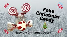 two candy lollipops in a glass vase with the words fake christmas candy