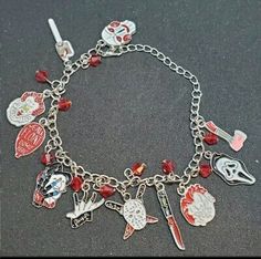 the charm bracelet has many charms on it