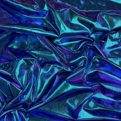 an image of blue and purple material that looks like metallic foil or plastic sheeting