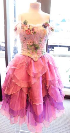 a dress on display in front of a window