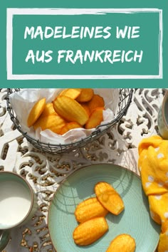 some fried food is on a table next to cups and saucers with the words madelines wie aus frankreich