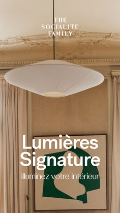 the front cover of a magazine with an image of a lamp hanging from it's ceiling