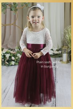 Burgundy Girls Dress Discover the enchanting world of flower girl and special occasion dresses! The dress is designed to make your little one shine. Choose the perfect dress and sash to match your wedding theme or special event. Think summer, fall and winter weddings or any special occasion. Dress Features A soft white bodice, made of stretchy lace with a "V" shaped on the back, edged with delicate lace. A cotton liner under 2 layers of soft tulle that won’t itch your princess. Dress length of m