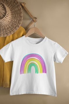 Cute rainbow T-shirt, perfect for Kindy or around the house. Bright, simple and modern. Rainbow T Shirt, Cute Rainbow, Rainbow Shirt, Kids Tops, The House, Gender Neutral, Kids Outfits, Tops & Tees, Rainbow