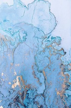 an abstract painting with blue and gold colors