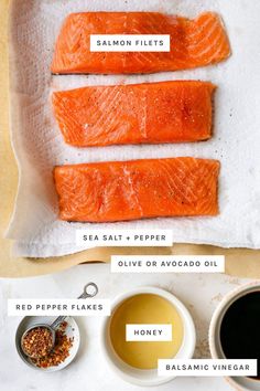 salmon fillets on parchment paper with spices and seasonings