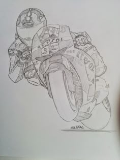 a pencil drawing of a motorcycle on paper