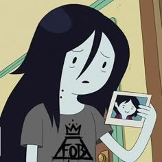 a cartoon character holding up a picture frame in front of her face and looking at the camera