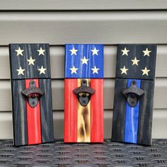 three wooden doors decorated with american flags and cowboy hats