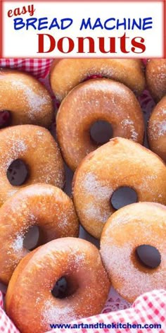 a pile of doughnuts sitting on top of a red and white checkered table cloth