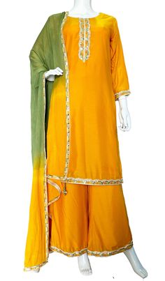 Mustard Yellow Muslin Flared Palazzo suit *Straight kurta(Top) with embroidery detailing on neck , sleeves  and hem(daman) .  *Wide leg palazzo pant with half elastic band and enough flare making it easy breezy. Embroidery at hem all around. *Hand dyed pure chinon shaded two color dupatta with matching tassels and a beautiful embroidery border Best for Indian weddings , Festivals, Navratri, Lohri, Diwali, Karwa Chauth, Pooja Dress, Mehndi, Haldi Ceremony, Henna Night and jaago events. WashCare: Orange Cutdana Palazzo Set For Festivals, Semi-stitched Orange Palazzo Set With Gota Work, Traditional Orange Palazzo Set With Gota Work, Orange Palazzo Set With Zari Work And Straight Kurta, Orange Semi-stitched Palazzo Set For Navratri, Festive Semi-stitched Palazzo Set In Orange, Festive Semi-stitched Orange Palazzo Set, Orange Palazzo Saree Set For Diwali, Festive Orange Semi-stitched Palazzo Set