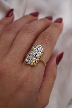 a woman's hand with a ring on it