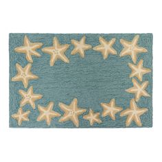 a blue rug with starfishs on it