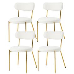 four white upholstered chairs with gold legs