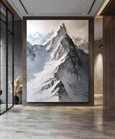 a large painting is hanging on the wall in a room with marble floors and walls