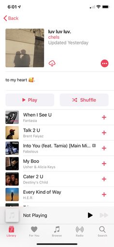 an iphone screen showing the music player's playlist and other items on it