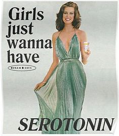 a woman in a green dress is holding a bottle and posing for a magazine advertisement