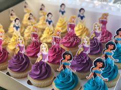 there are cupcakes with princesses on them