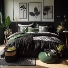 a black and white bedroom with plants on the wall, bed linens in dark colors